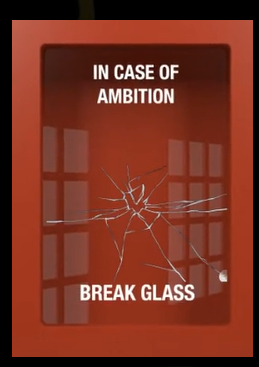 Red emergency box reading: In case of ambition, break glass