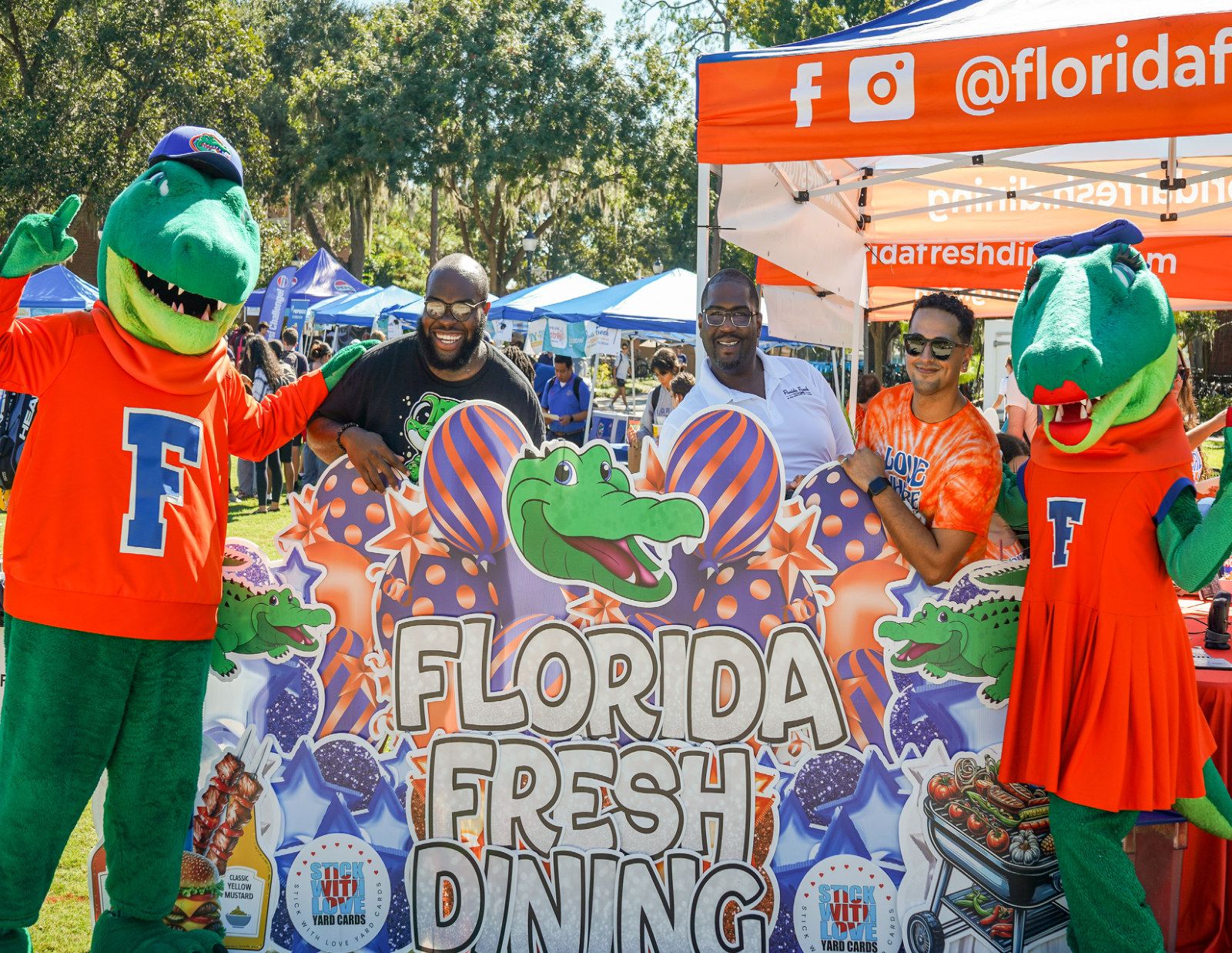 Florida Fresh Dining tent with Albert and Alberta at a campus event