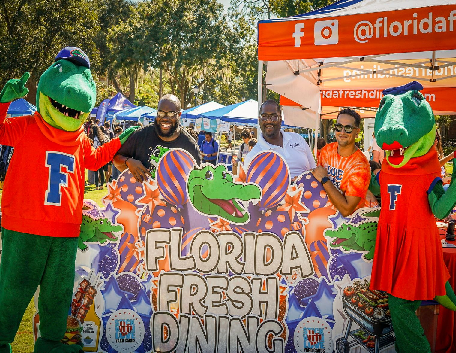 Florida Fresh Dining tent with Albert and Alberta at a campus event